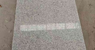 阳江芝麻白光面毛板