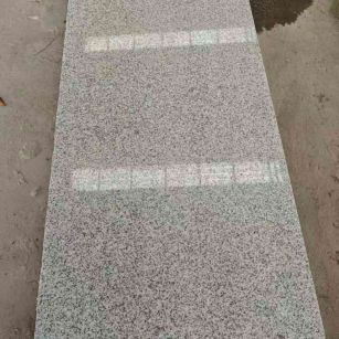 阳江芝麻白光面毛板